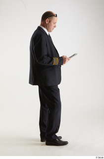 Jake Perry Pilot with IPad standing whole body 0007.jpg